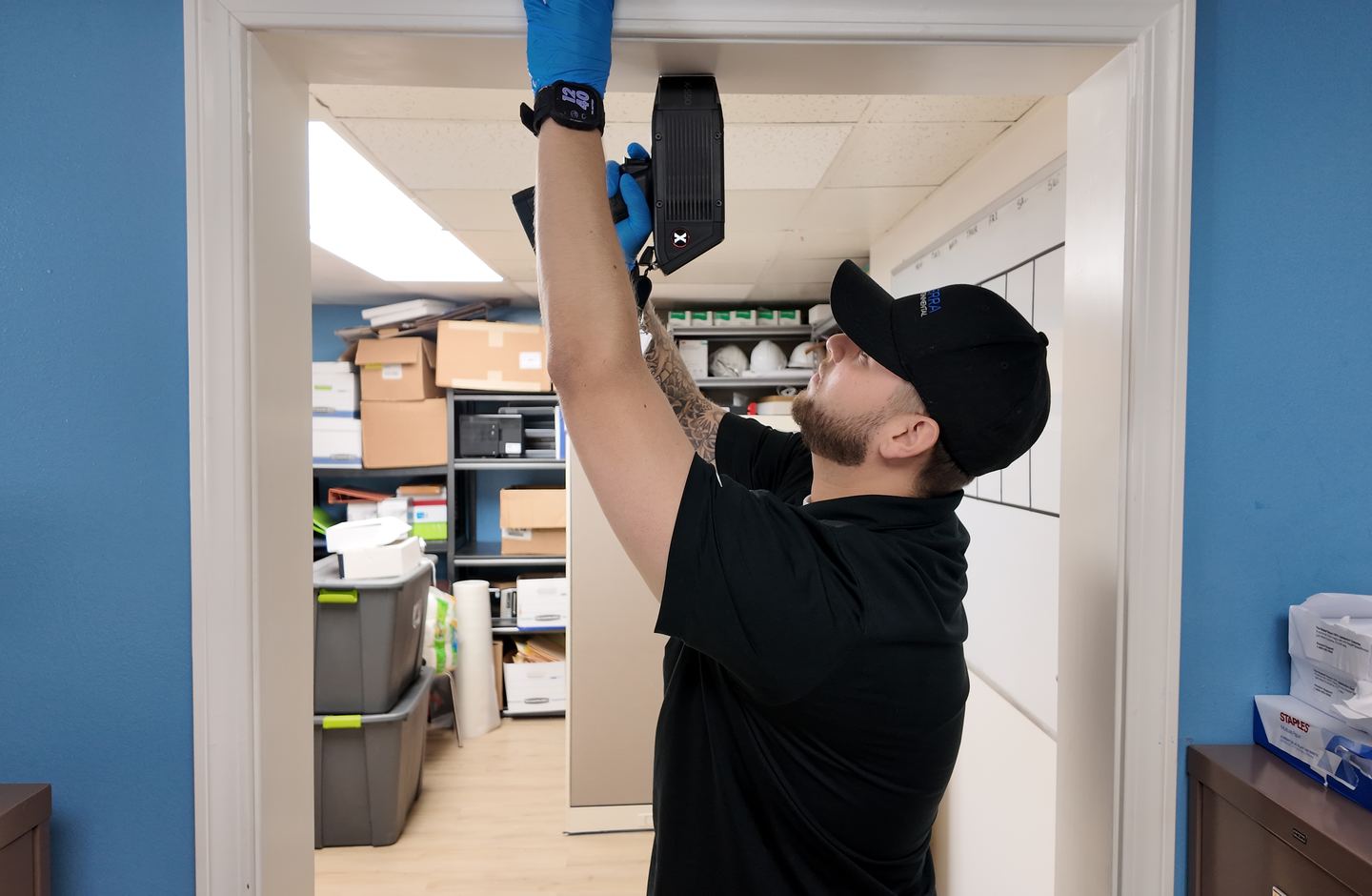TERRA technician performing an XRF lead paint inspection at our Santa Fe Springs office